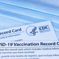 Closeup.,Covid-19,Vaccination,Record,Cards,Issued,By,Cdc,,United,States Closeup.,Covid-19,Vaccination,Record,Cards,Issued,By,Cdc,,United,States